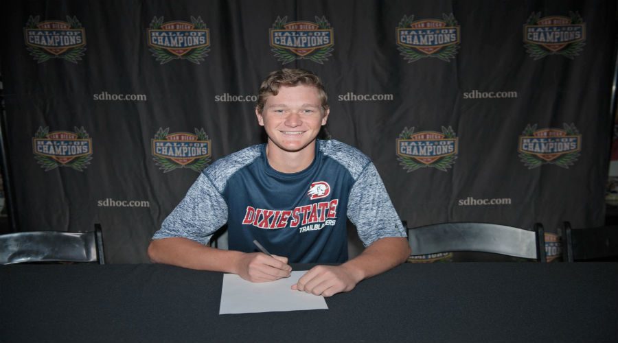 Sports Editor, Drake Benner signs his contract to make it official with Dixie State.