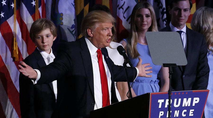  Donald Trump, flanked by his extended family, accepts his election to the Presidency. (Brendan McDermid - Reuters) 