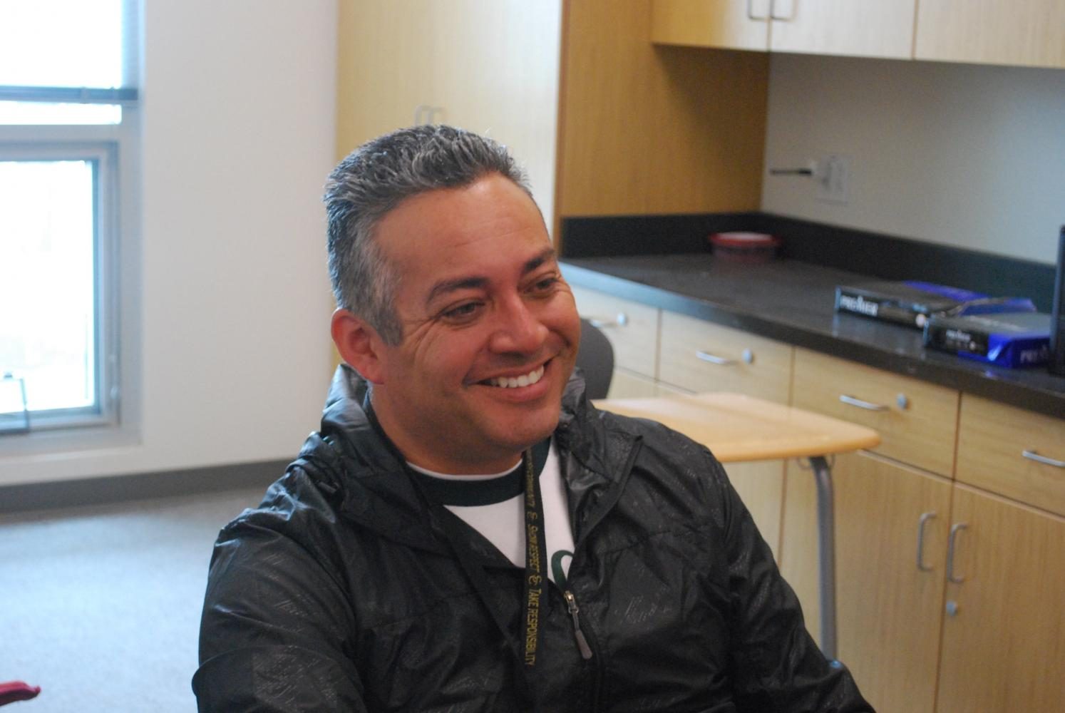 Mr. Morales smiles as he reflects upon his journey as Sage Creek's principal. 