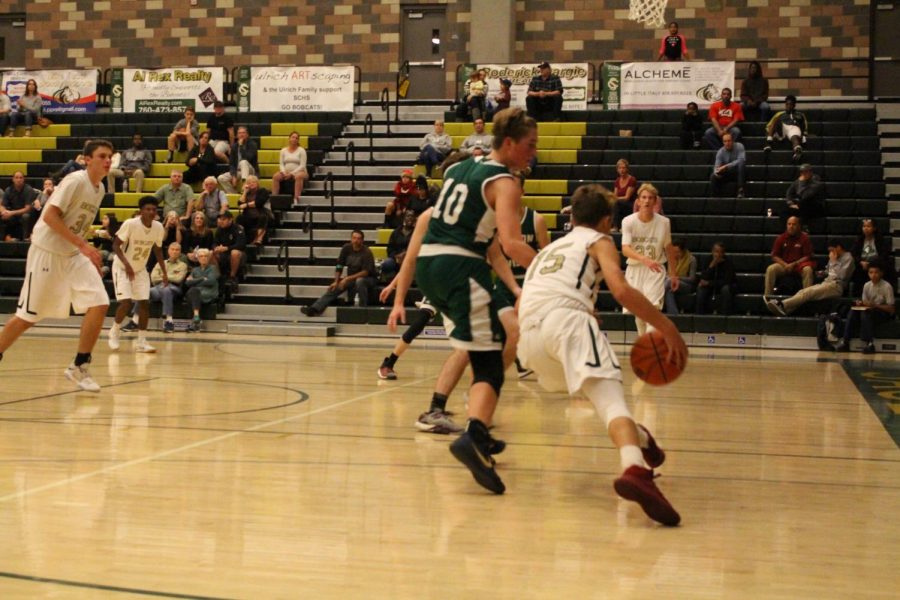 Junior Nick BLANK defends the ball from the opposing team, Mission Vista, during Sage Creek’s first game of the season. It was a close game back and forth but Sage Creek came out on top.