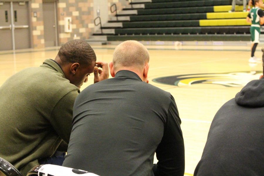 The Boys Varsity coaches contemplate the next move in Sage Creek’s first home game of the season. After being in the lead for most of the first half Sage Creek begins to let their guard down, but in the end the Bobcats come out on top. 
