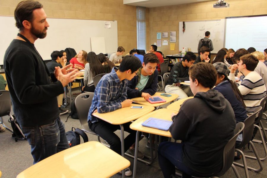 Mr. Griesbach guides students through calculus tutoring.