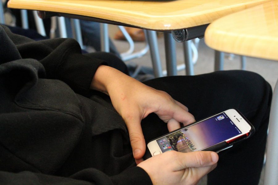 The detriments of cell phones have caused students to be distracted in class, leading to frustrated teachers and grades dropping. 