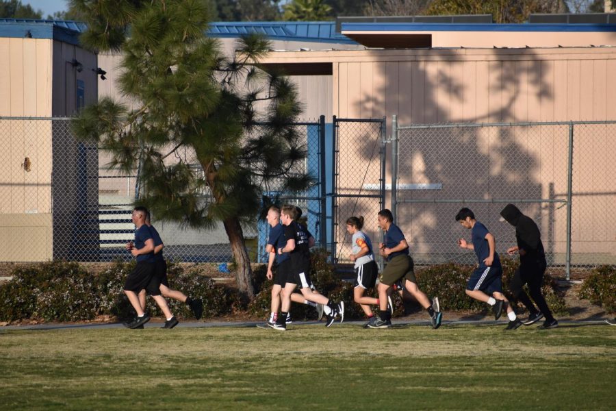 The recruits push themselves to their limits as they run another lap at the sergeant’s orders.