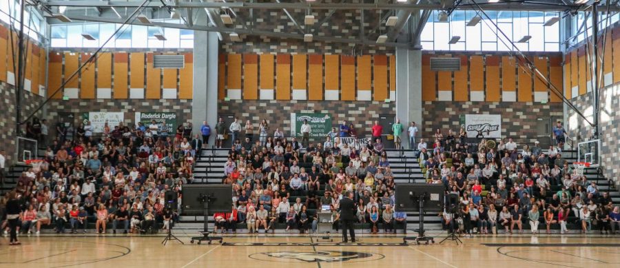 Parents gather in the Bobcat Arena to hear an introductory Back to School Night presentation by principal Morales. Morales spoke to the parent audience and addressed multiple topics that included current school logistics on safety, education and athletic programs.