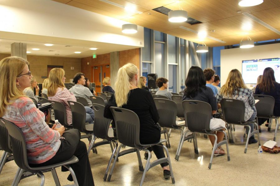 Parents and students convene in the cafeteria on Wednesday night on Sept.to hear Superintendent Benjamin Churchill speak. He discussed the finances of every school in the Carlsbad district in depth. 