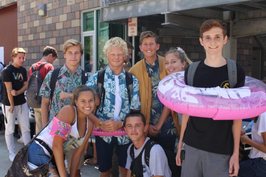 Seniors Carla Kelliny, Adam Salter, Oliver Schnitzenbaumer, Chris Engel, Jackson Ginn, Maddie Devilbiss and Tim Baxter, show Bobcat spirit for “Floaty Friday”. Seniors anticipate the start of senior assassins by participating in the spirit day that helped them get in the habit of wearing a floaty for protection against their “assassins.”