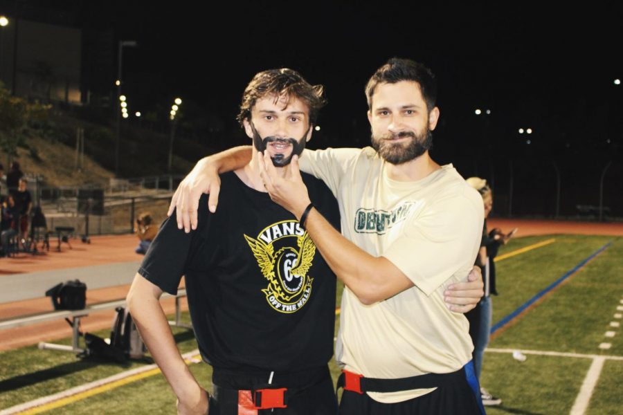 One of the same! Senior Troy Howerton poses next to English teacher George Porter as he shows off his impressive sharpie beard.