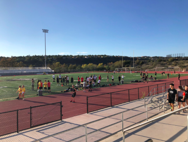Several teams of students practice for their upcoming games in the flag football tournament on Friday, Oct. 5. The winner of the student games will go on to face the staff team “The Detention Room.”