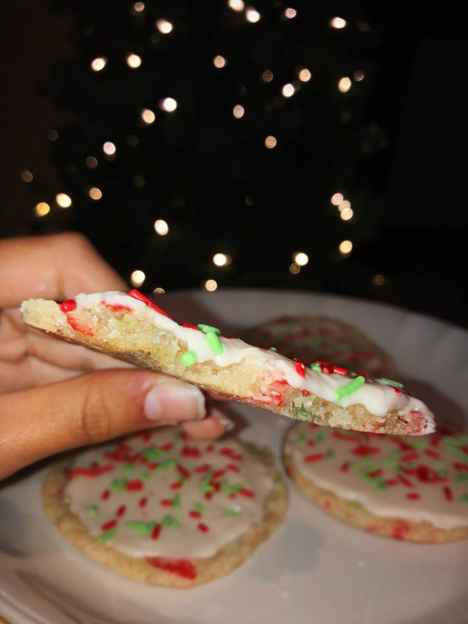 A remake of a vegan sugar cookie recipe found on a plant-based cooking blog. The soft and sweet cookies were decorated with frosting and red and green sprinkles to get you in the Christmas spirit. 

Ingredients
1 cup vegan butter slightly softened 
1 cup granulated sugar
1 flax egg (1 tbsp ground flaxseed + 3 tbsp water)
1 teaspoon pure vanilla extract
2.5 cups all-purpose flour
2 teaspoons baking powder
1 small pinch of salt
2-3 tablespoons sprinkles (optional)
https://www.saltandlavender.com/vegan-sugar-cookies-soft-no-chill/ 
