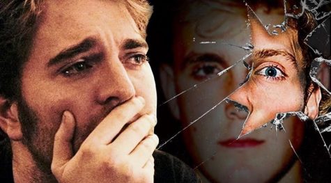 Shane Dawson is distraught in front of a conjoined image of Jake and Logan Paul. Dawson became emotionally invested in his research over the controversy of the Paul brothers. 