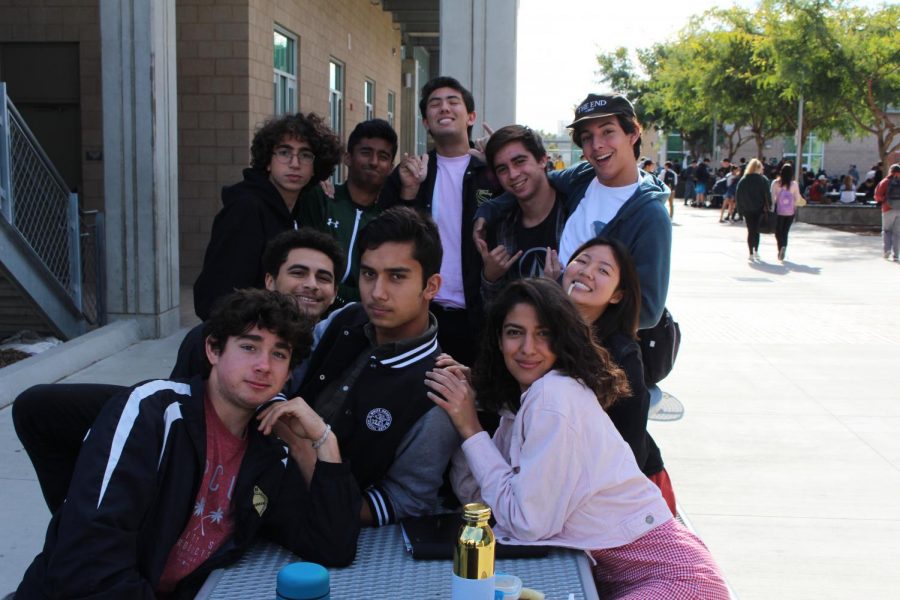 A group of seniors with an addition of freshman Shervin Bahmanpour, took a few moments to pose at lunch this Tuesday.