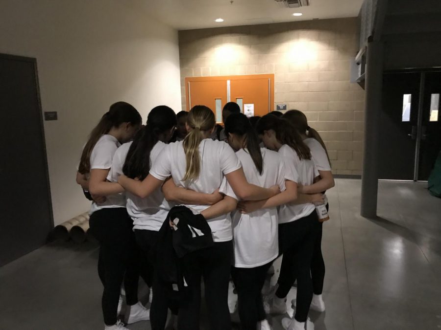 Last Friday, Sage Creek Dance Company prayed as a group before performing for the second time. While dancing at basketball’s halftime show their music cut out, but they kept dancing to cheers from the Bobsquad. At the end of the game, Dance Company took to the court one more time to reperform with music.