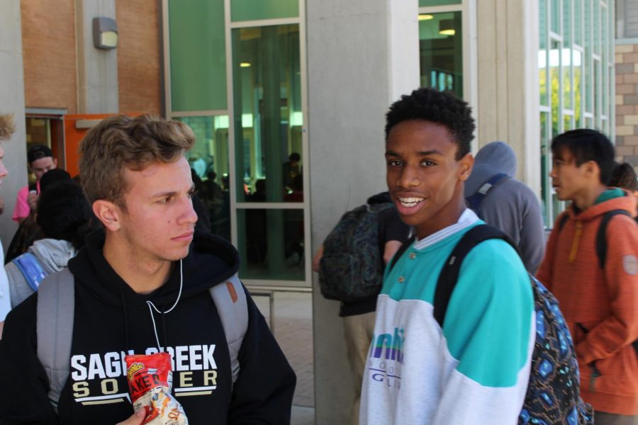 Titus Washington and Jet Trask wait in line to buy lunch. Both Washington and Trask are going to play collegiate soccer at Sacramento State University in the Fall.