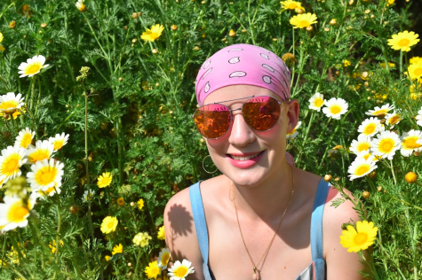 In a field of flowers Charissa Feldmann is all smiles. Wherever she goes, joy follows as she continues to inspire those around her to find beauty in everything that life has to offer.