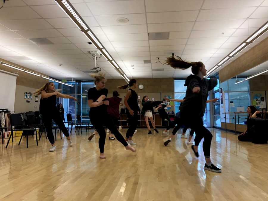 Dance company practicing after school to prepare for their upcoming show. The dance department is putting on the show Breaking Boundaries in the PAC May 23 and 24.