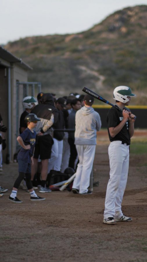Brandon Cimicata watches the pitcher he is about to face up against. Although Sage Creek lost to Carlsbad 4-3, they’re playing hard in the pre-season. 