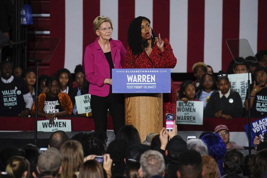 House Representative Ayanna Pressley stands with Democratic hopeful Elizabeth Warren at her campaign event in Atlanta, Georgia. Pressley has backed Warren and is working to ensure Warren the black vote.