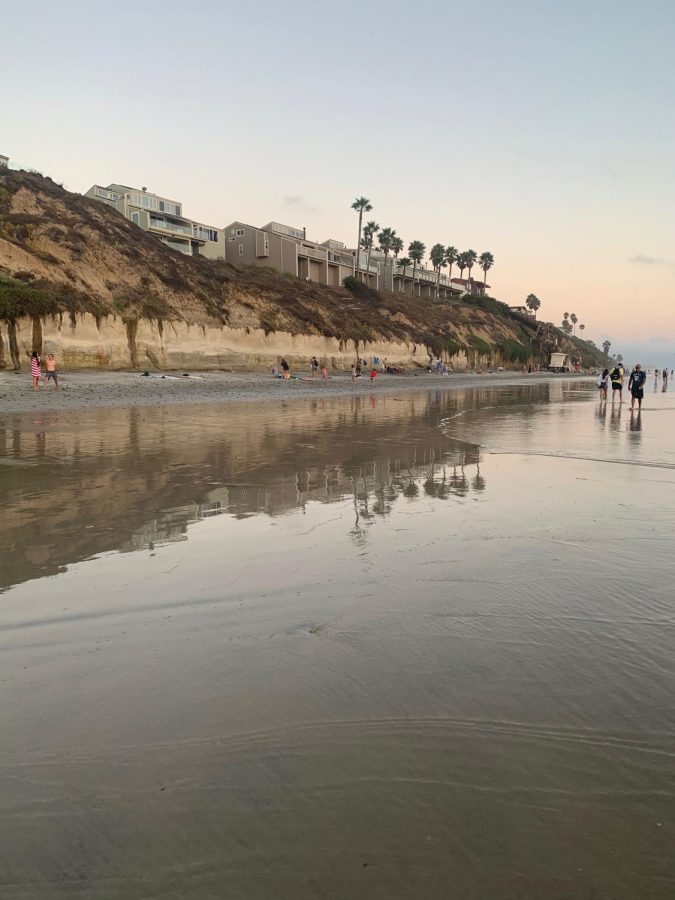 Local North County residents enjoy the sunset at Ponto Beach. The beach has been a popular place to go even after the outbreak of COVID-19 due to it’s outdoors nature.