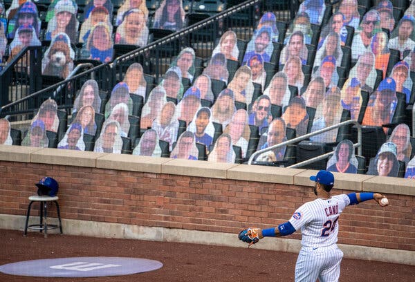 New York Met second basemen, Robinson Canó plays caught before a game without any fans in attendance. For the first time in MLB history, no fans were allowed for the entire 2020 MLB season due to the Covid-19 pandemic, although fans could purchase cardboard cut-out pictures of themselves to be put in certain seats at their desired stadiums.
