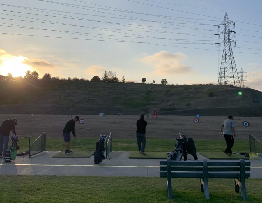 People in the Carlsbad community meet at the driving range to golf. Golfing is a sport widely enjoyed during the pandemic, as it is outdoors and naturally abides by social distancing guidelines.