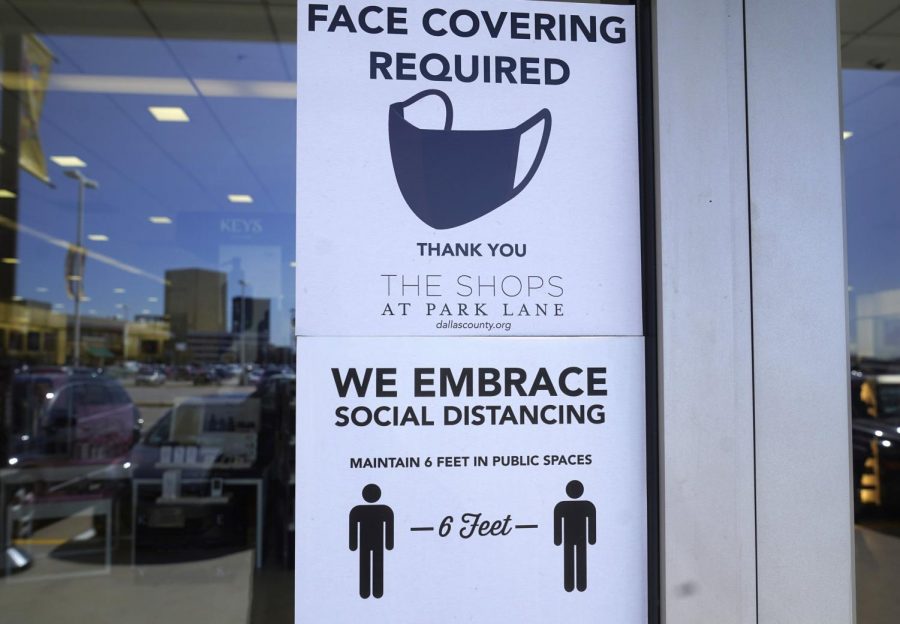  This sign is present at the entrance to the Shops at Park Lane in Dallas, Texas. With the lifting of the coronavirus restrictions in Texas, businesses now have the opportunity to make masks a requirement or not.