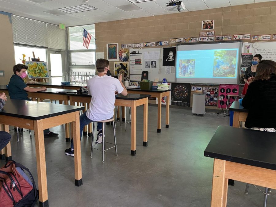 Art History Club meets in person and explores their discussion question: “Is art improving or regressing?”  While their meetings had been online for the majority of the school year,  recently they’ve been able to connect together at school.