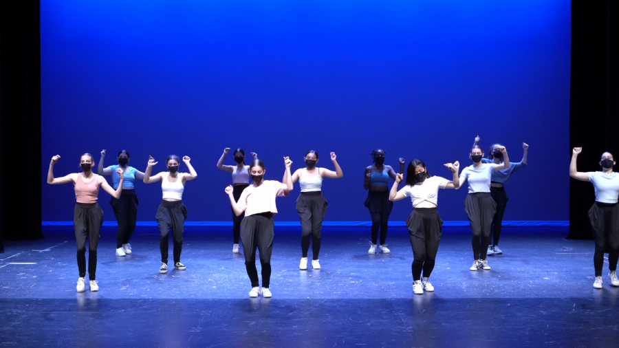 Dance 2 and 3 step downstage during their Hip-Hop performance. These students have dedicated additional time outside of school to pursue their passions, even during a global pandemic.