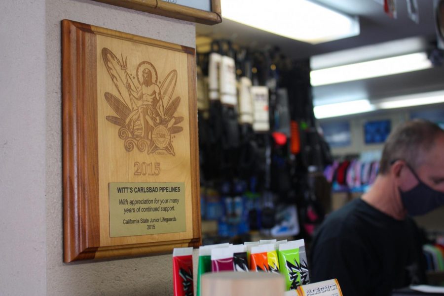 Beside the register, an appreciation plaque from the Junior Lifeguards hangs on the wall. Carlsbad Pipelines has been a great support to countless local organizations and athletes. 