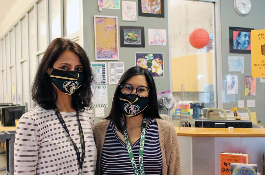 Shali (left) and DeLeon (right) pose in front of the librarians’ desk. The two librarians have worked together previously at Aviara Elementary and Middle School, an experience which has strengthened their bond as counterparts and close friends. 