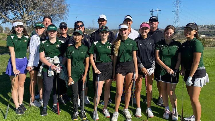 The players of the golf team as well as some of the Sage Creek staff pose for a photo. It was expressed that everyone here would want to play in the Staff vs. Student event again.