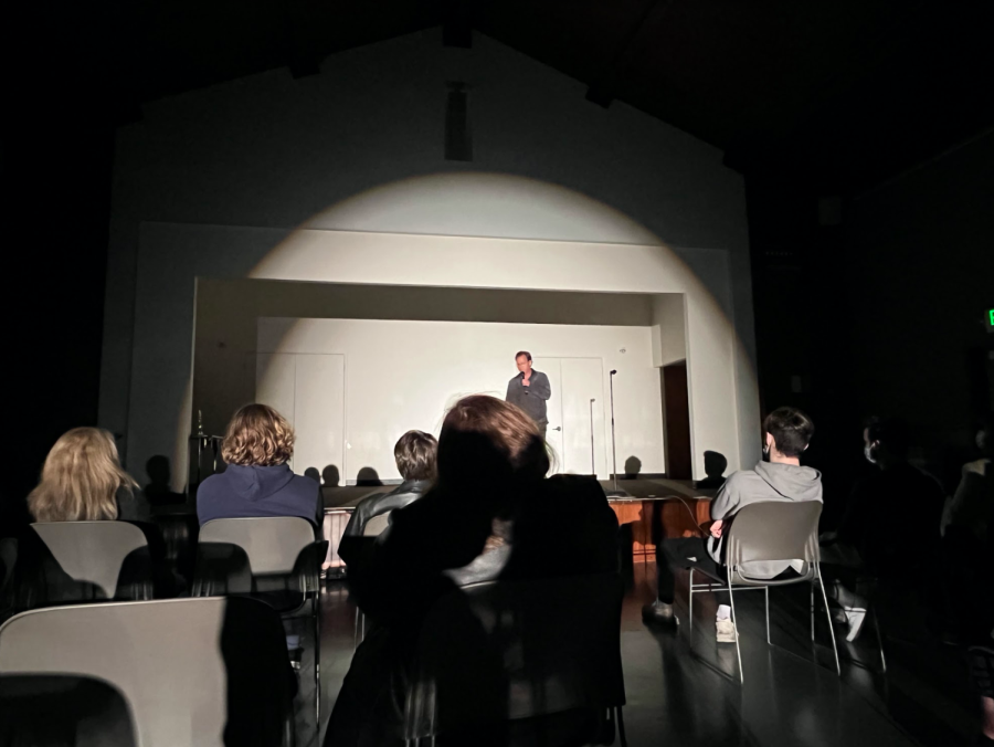 The audience sits in their seats, the lights go out, the show starts and Lee welcomes the audience and starts the standup. The stand up is hosted in a theater. The attendees and participants spoke of this building as very mystical and abandoned feeling. 