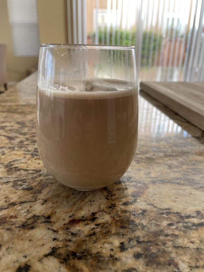 This homemade iced latte consists of organic espresso beans and Kirkland oat milk. As a healthier take, this fully organic coffee tasted like any average coffee would.