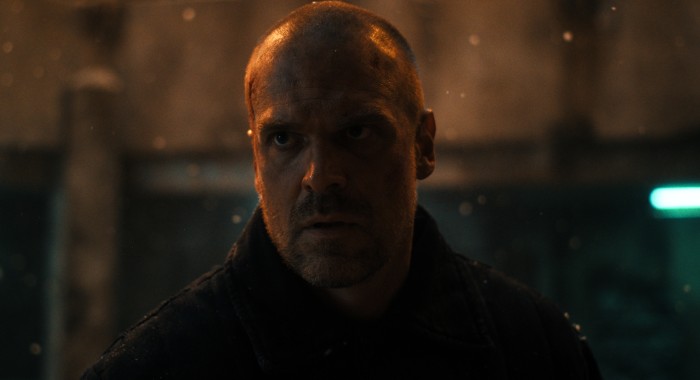 Hopper is being held by the Russian against his will. In the season three finale, Hopper was thought to have sacrificed himself in order to close the portal to the Upside-Down. 