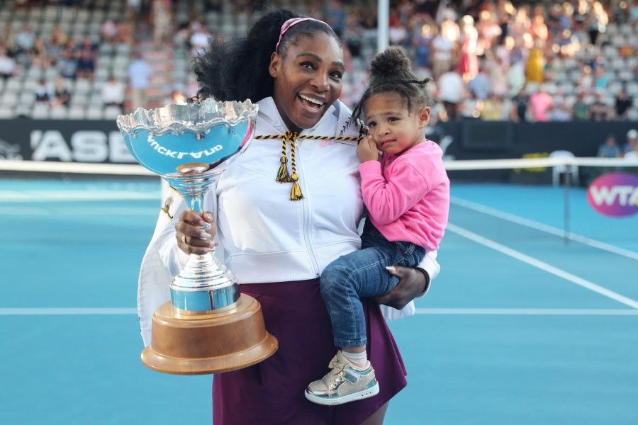 Serena+Williams+poses+with+her+daughter%2C+Olympia%2C+after+taking+the+trophy+home+early+2020+during+the+ASB+Classic+in+New+Zealand.+One+of+Williams+main+priorities+with+retirement+has+been+her+commitment+to+raising+her+five-year-old+child.