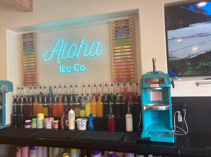 A look at the interior of Aloha Ice Co.’s building is presented. There’s a wide array of colorful flavors to find on the menu.