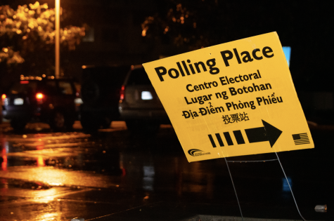Voters park at a polling station on a rainy election day. While weather can play a significant role in voter turnout, hundreds of people still showed up to cast their vote at Pacific Rim Elementary School.