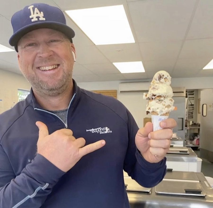 Weenig smiles while holding his favorite ice cream for a photo. Weenig’s legacy will be present as Handel’s continues to flourish.