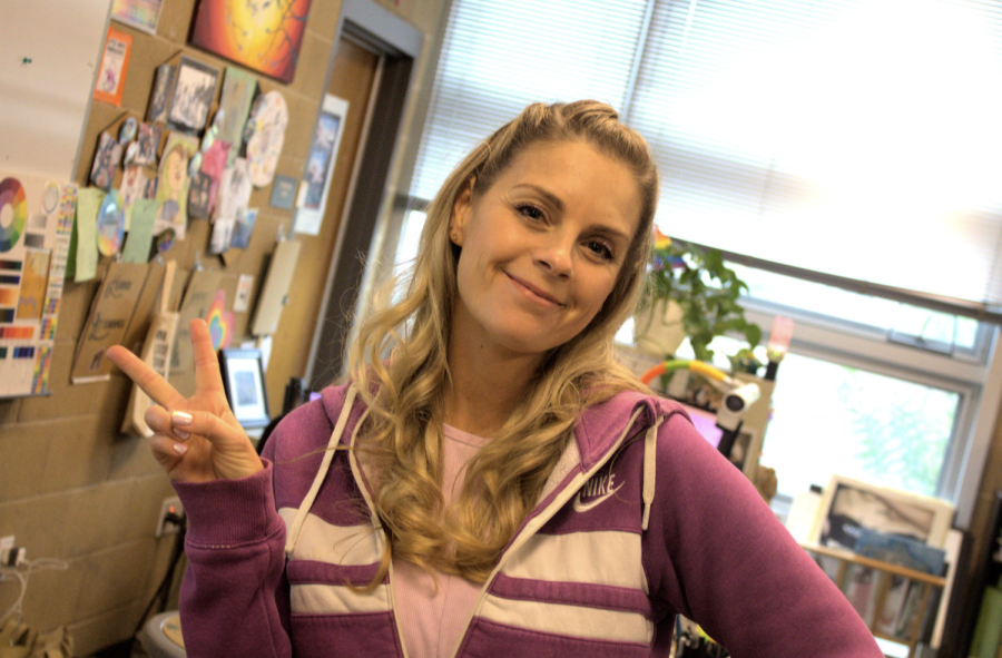 AP Art History and Art teacher Megan Herrick sports a pink jacket look that is straight from the 2000s. Both teachers and students channeled the early 2000s last Monday.