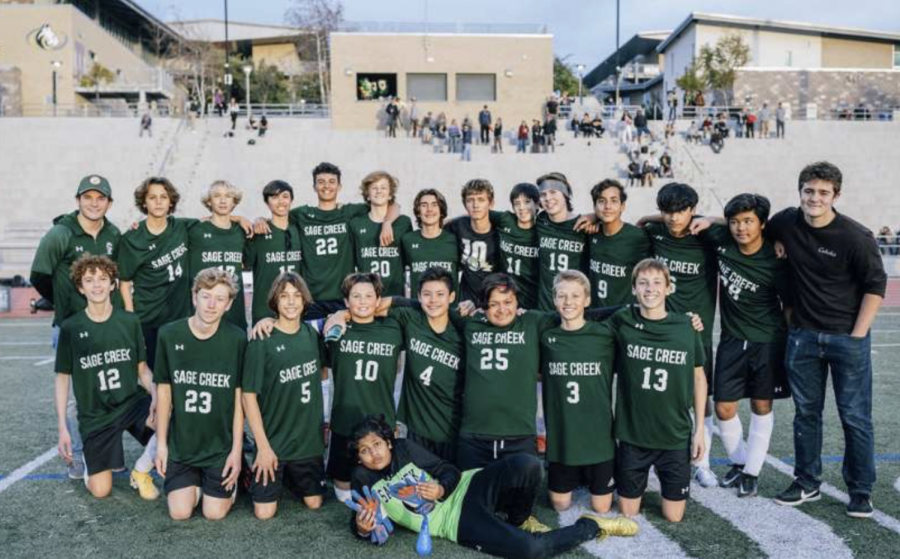 The boys Freshman soccer team huddles up for a team picture after a game. Even though the team doesn’t have an amazing record, they still remain friends on and off the field.