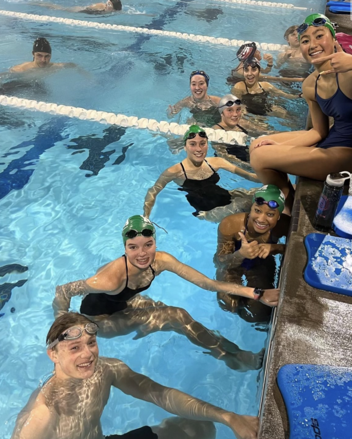 The new swim team comes together for a picture after a hard set on the first day of practice. Even being a new team, the athletes never fail to support each other in, and out, of the pool.