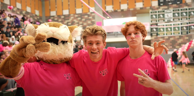 Jett Dean and Justin Baldner pose with Bobby the Bobcat covered in pink to show their support of Breast Cancer Awareness. ASB worked with countless groups to advocate for the importance of spreading awareness surrounding breast cancer.