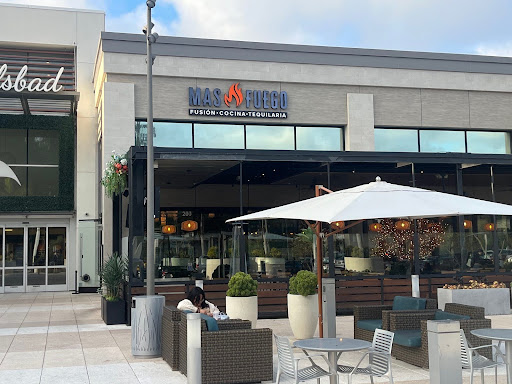 Mas Fuego’s main entrance is located near the Marron Road entrance  to the mall. It operates next to Yard House and the Regal Cinema.

