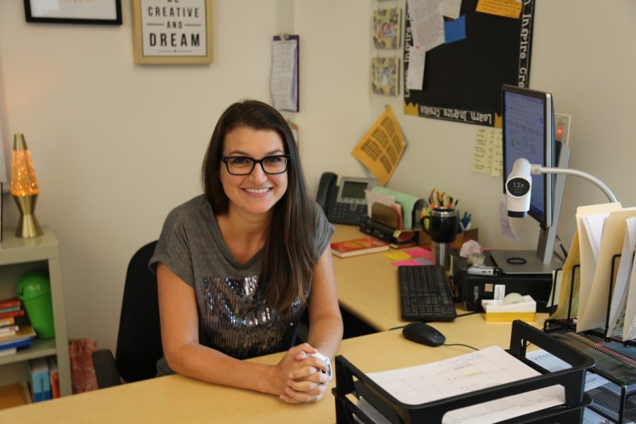 Ms. Hunter at her new desk in her first very own classroom