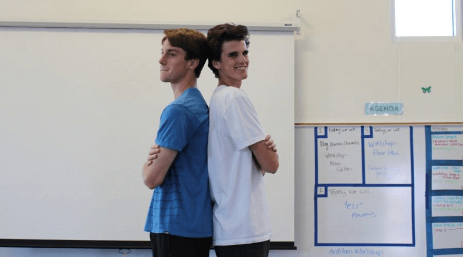 Photographer: Bailey Moncrief

Senior, Skyler Beckett (left) and junior, Jeff Wattner (right) stand back-to-back in a comedic pose. They will be the hosts of Café Bobcat