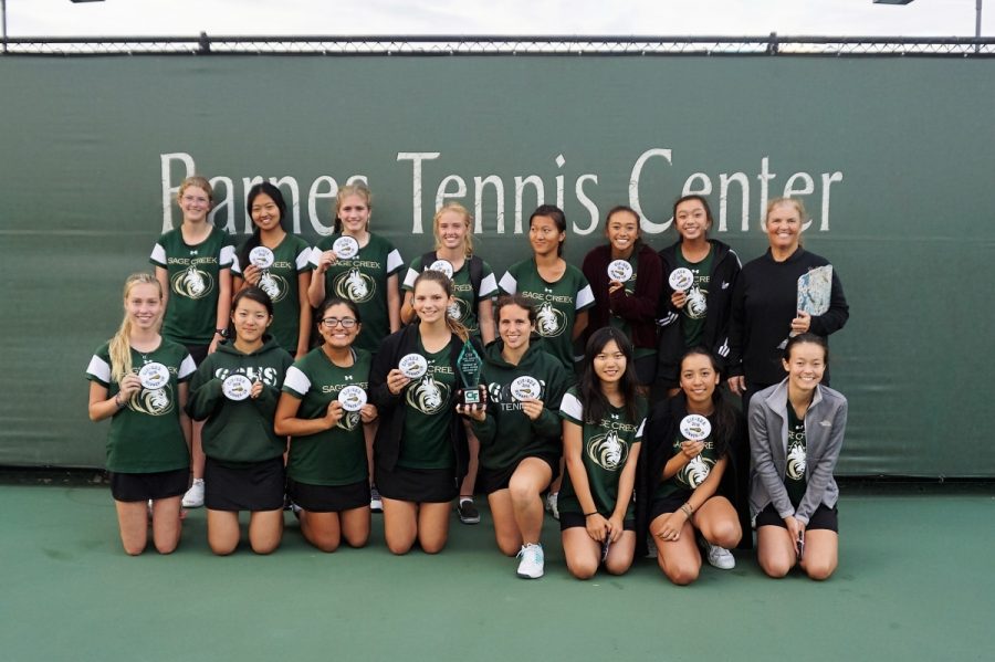 Photographer: Elijah Kinnell

Sage Creek's Varsity Girl's Tennis Team huddles together for a group photo.