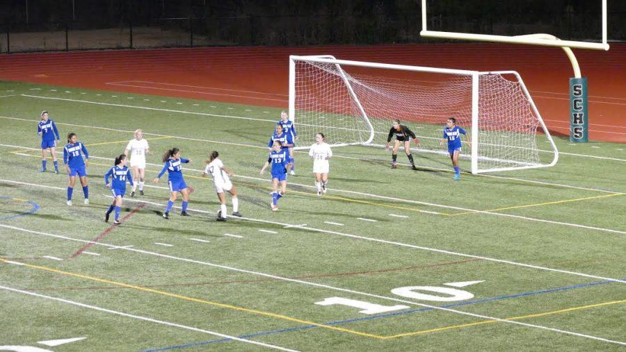 Isabel Sloss #17 with the ball at her feet in the middle of a set piece play. 
Photo courtesy of Joe Zueck

