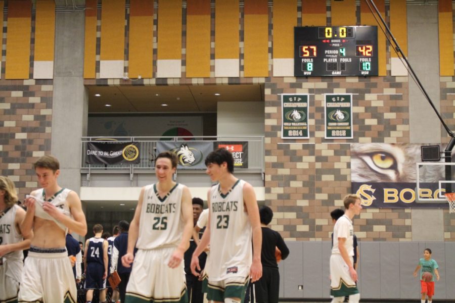 Seniors Jacob Uhl, Bryce Buscher, and Dylan Rossi are all smiles after their 57-42 victory against San Dieguito Academy. Their victory ended a four game losing streak and has propelled them with surging momentum going into Friday's Hoopcoming game.