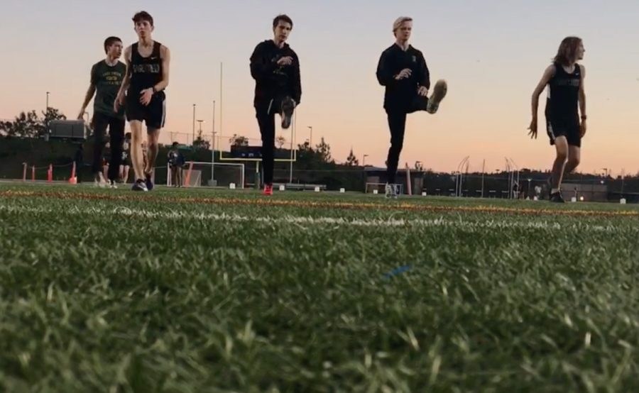 Track and field team prepares for a race. 