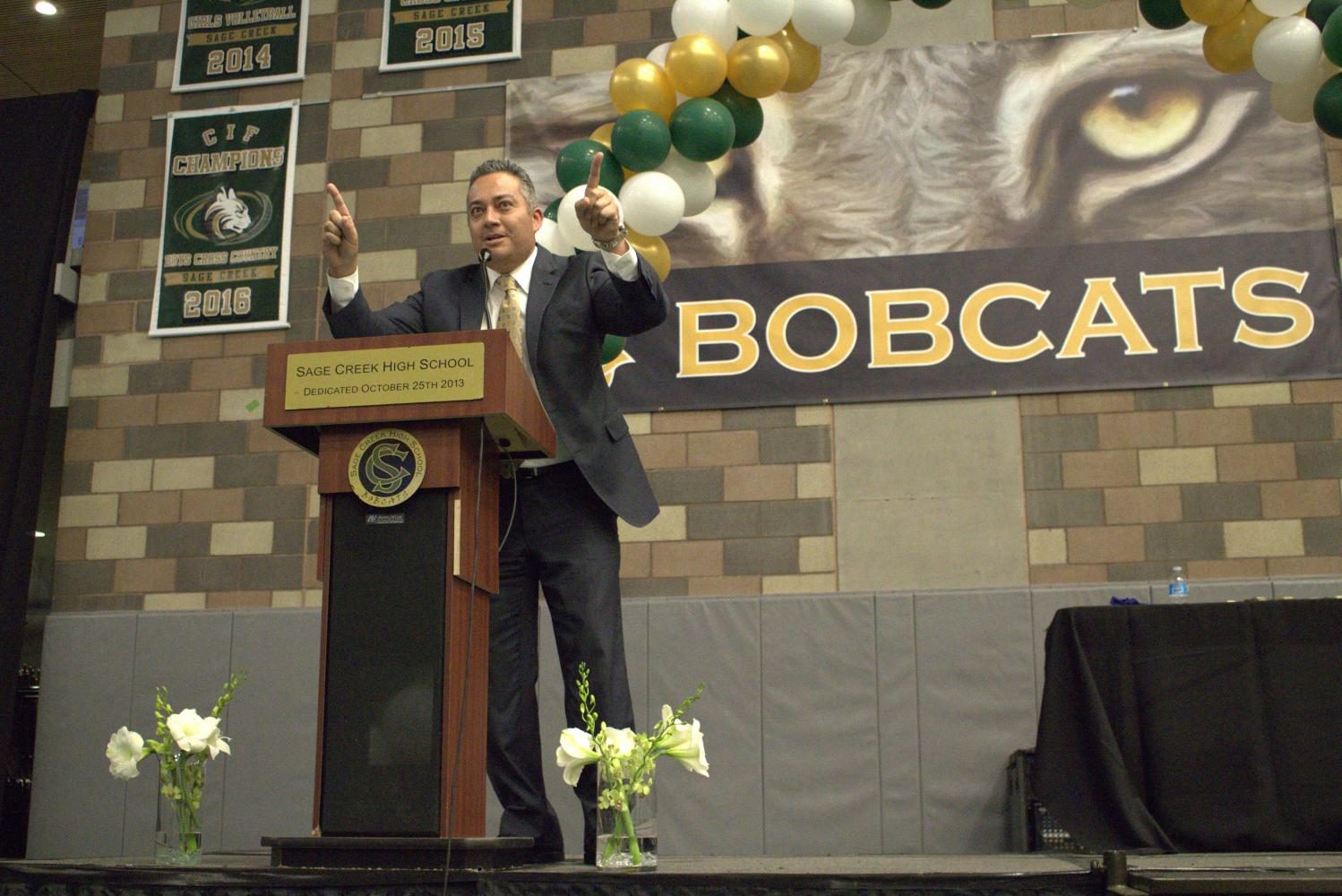 Principal Cesar Morales greets the festive crowd on senior awards night.